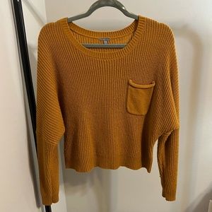 Yellow knitted sweater